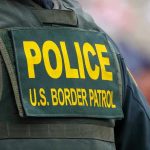 Police U.S. Border Patrol uniform close-up.