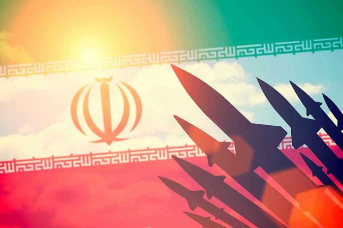 Silhouettes of missiles over Irans flag graphic.