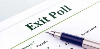 Close-up of an exit poll survey form with a pen